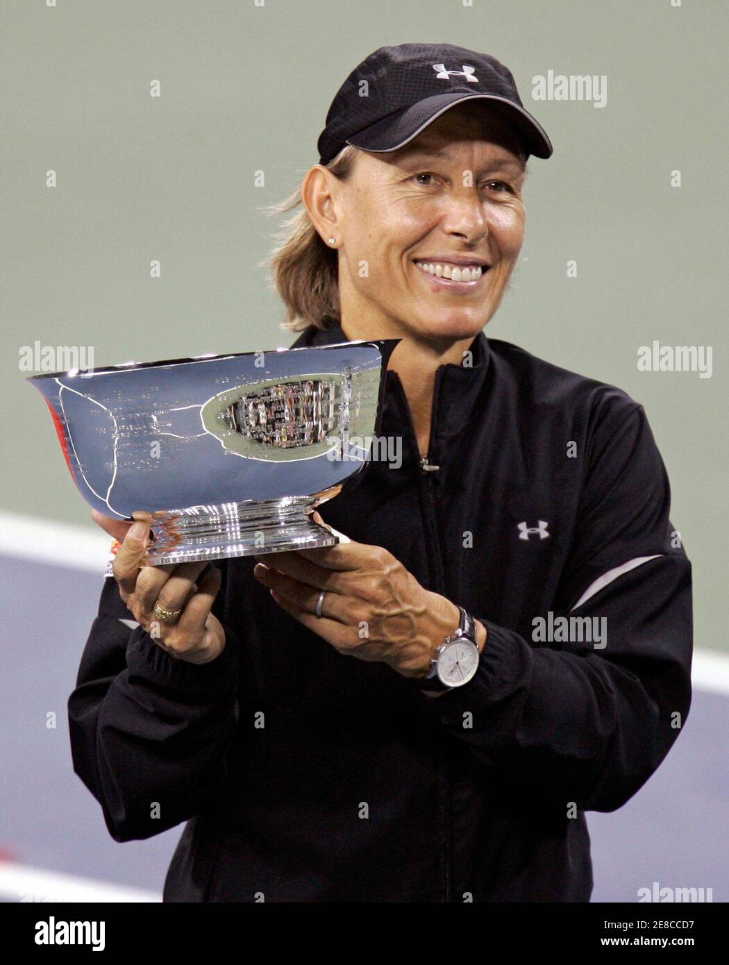 Martina Navratilova of the U.S. holds the mixed doubles trophy after her  win over the Czech Republic's Kveta Peschke and Martin Damm at the U.S.  Open tennis tournament in New York, September