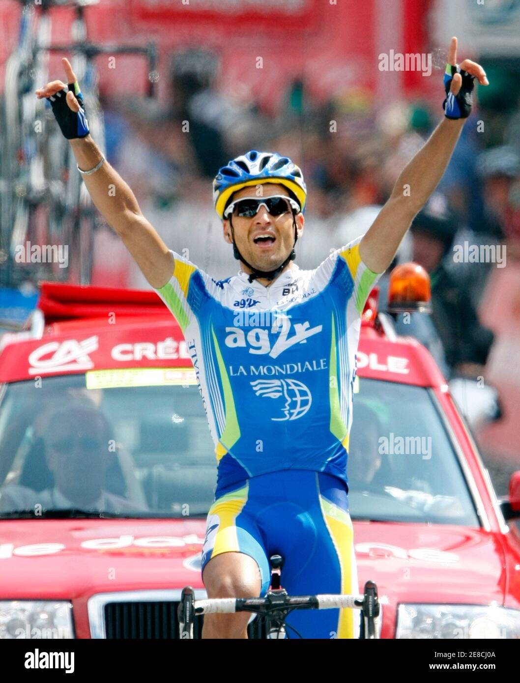 Cyril Dessel of France celebrates winning the fourth stage of the Dauphine cycling race between Vienne and Annemasse, in Annemasse, French Alps June 12, 2008.    REUTERS/Robert Pratta (FRANCE) Stock Photo