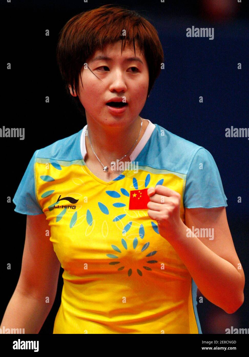 China's Yao Yan celebrates after winning a point during her table tennis women's singles semifinal match against South Korea's Seok Hajung at the East Asian Games in Hong Kong December 6, 2009. REUTERS/Tyrone Siu (CHINA SPORT TABLE TENNIS) Stock Photo