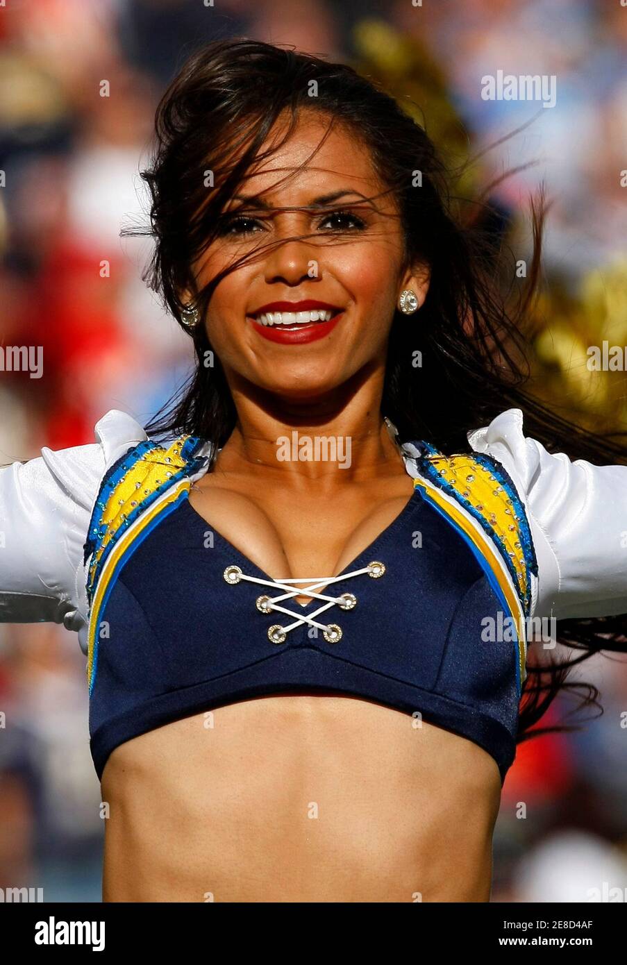 A San Diego Chargers cheerleader performs during a break in the game