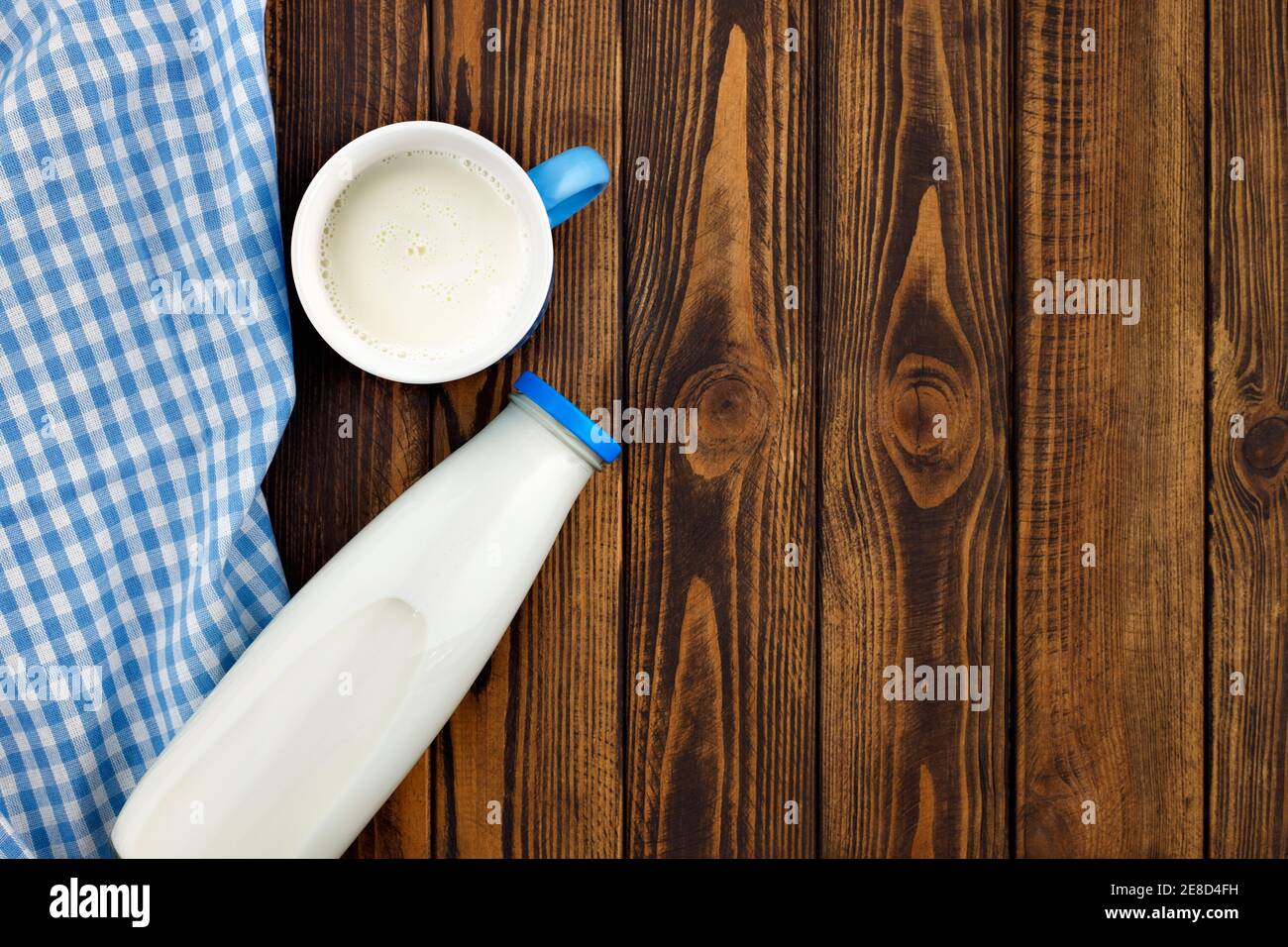 milk in glass bottle and cup Stock Photo