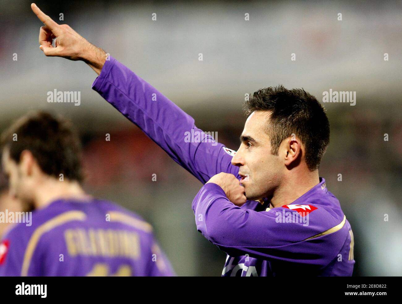 Fiorentina's Marco Marchionni celebrates after scoring against Juventus during their Italian Serie A soccer match at the Artemio Franchi stadium in Florence March 6, 2010.     REUTERS/Giampiero Sposito (ITALY - Tags: SPORT SOCCER) Stock Photo