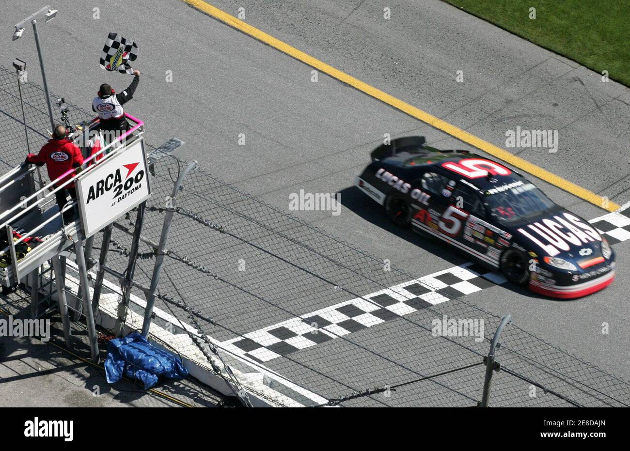 Bobby Gerhart takes the checkered flag in the 5 Lucas Oil Chevrolet to win the ARCA 200 at the Daytona International Speedway in Daytona Beach, Florida February 12, 2006.  REUTERS/Rick Fowler Stock Photo