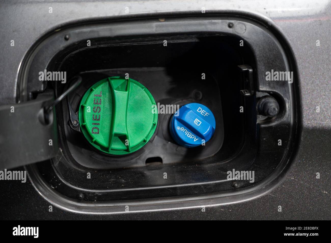 Seoul, South Korea - Jan 2021 : Adblue diesel exhaust fluid DEF and diesel fuel tank cap. Stock Photo
