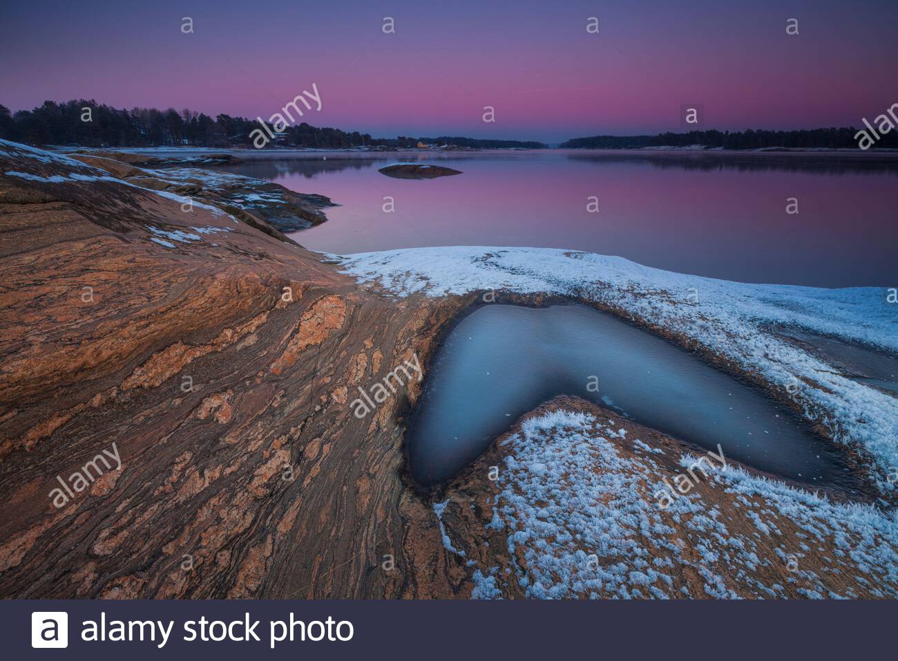 Beautiful coastal winter landscape in evening light, at Oven by the Oslofjord, Råde kommune, Østfold, Norway. Stock Photo