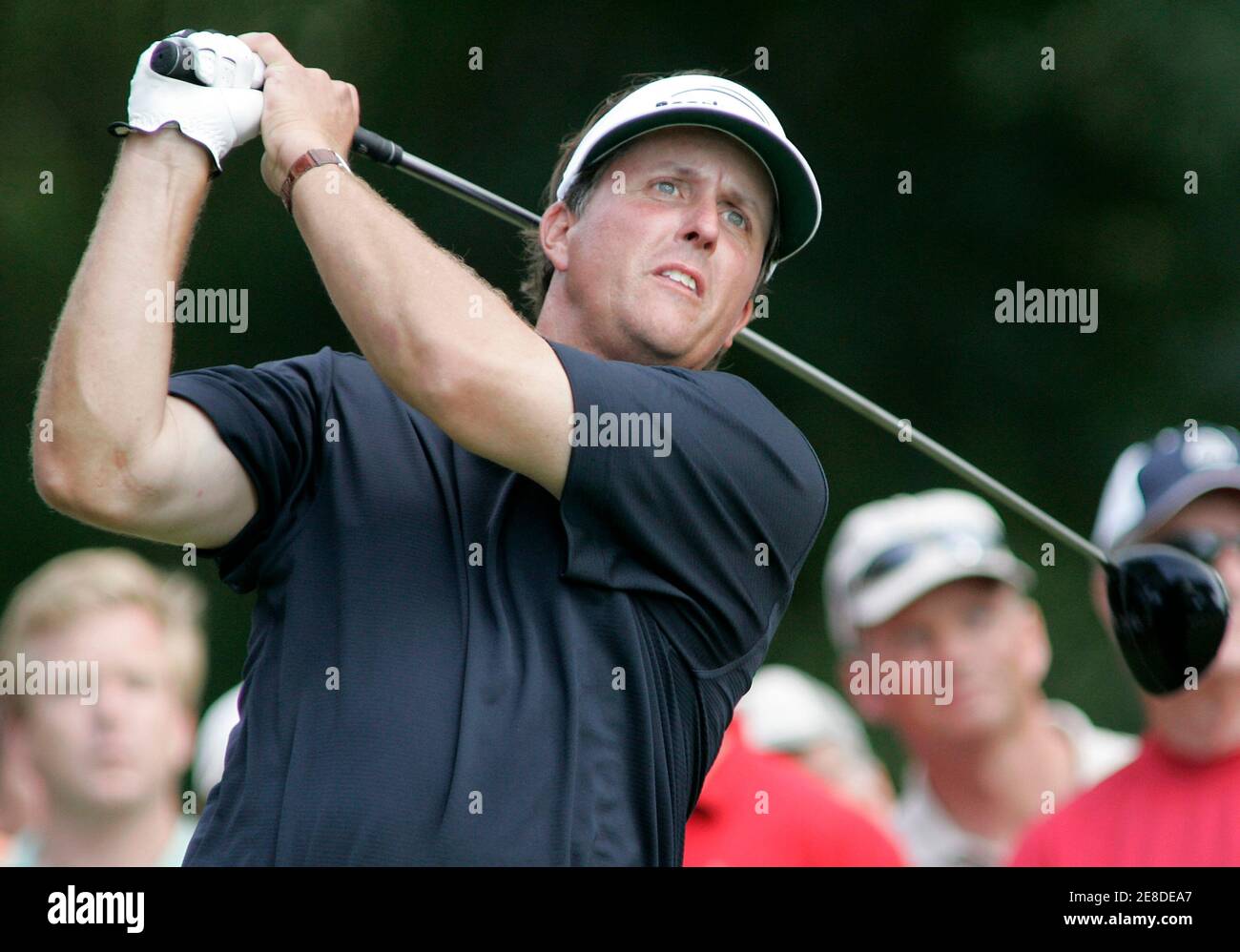 Phil Mickelson of the U.S. tees off on the 15th hole during the final round of The Players Championship golf tournament in Ponte Vedra Beach, Florida, May 13, 2007. Mickelson won the tournament and finished at 11-under-par with a score of 277. REUTERS/Rick Fowler (UNITED STATES) Stock Photo