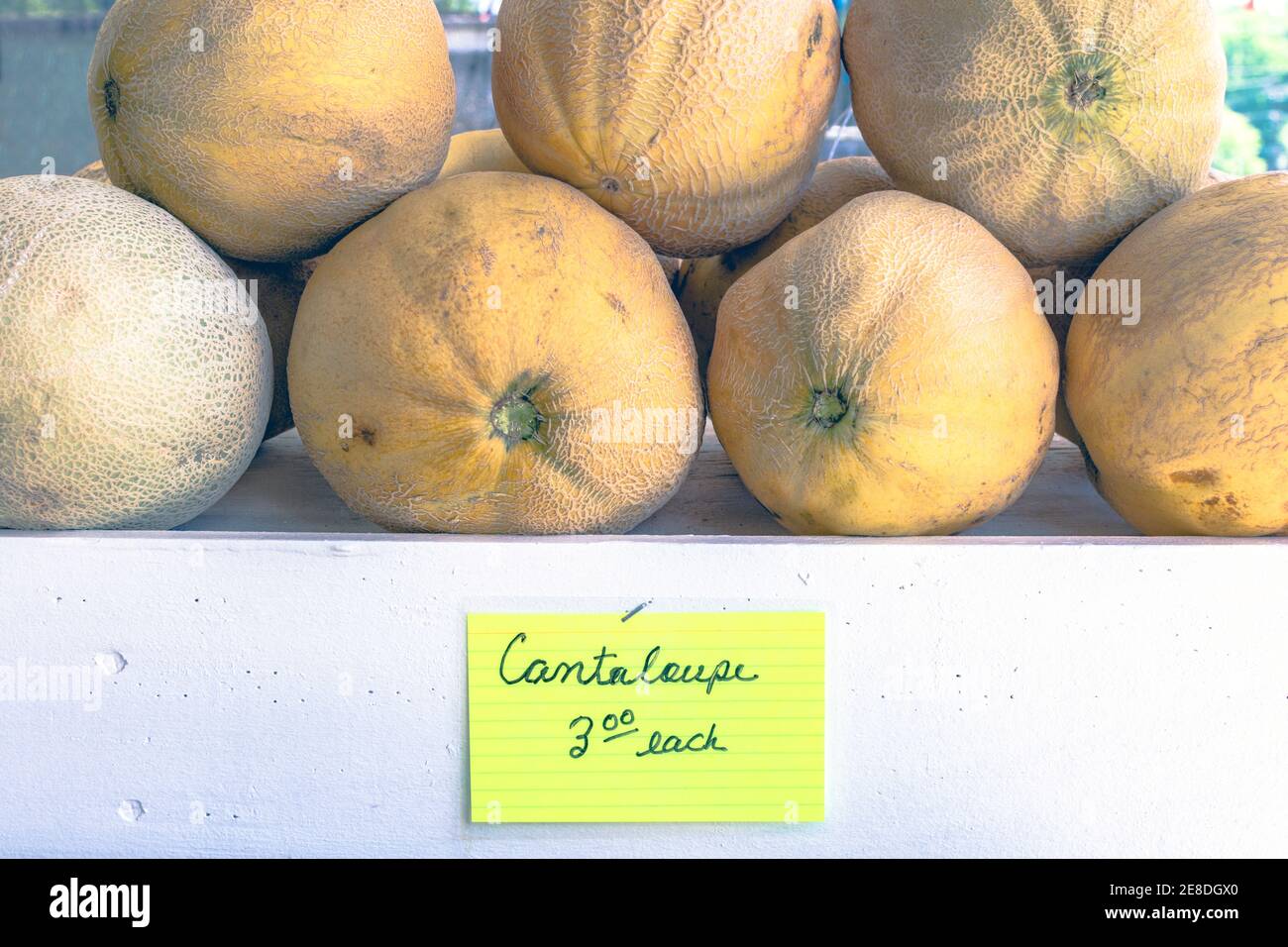 cantaloupe on display at a produce stand Stock Photo