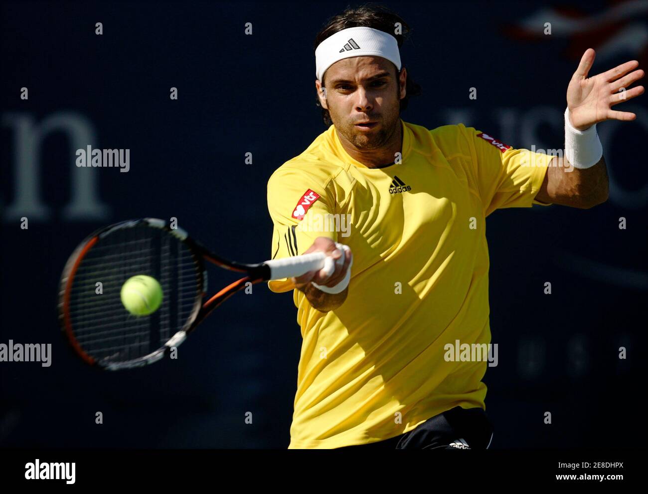 Fernando Gonzalez of Chile hits a return shot to Ivan Navarro of Spain  during their match at the U.S. Open tennis tournament in Flushing Meadows,  New York August 26, 2008. REUTERS/Eduardo Munoz (