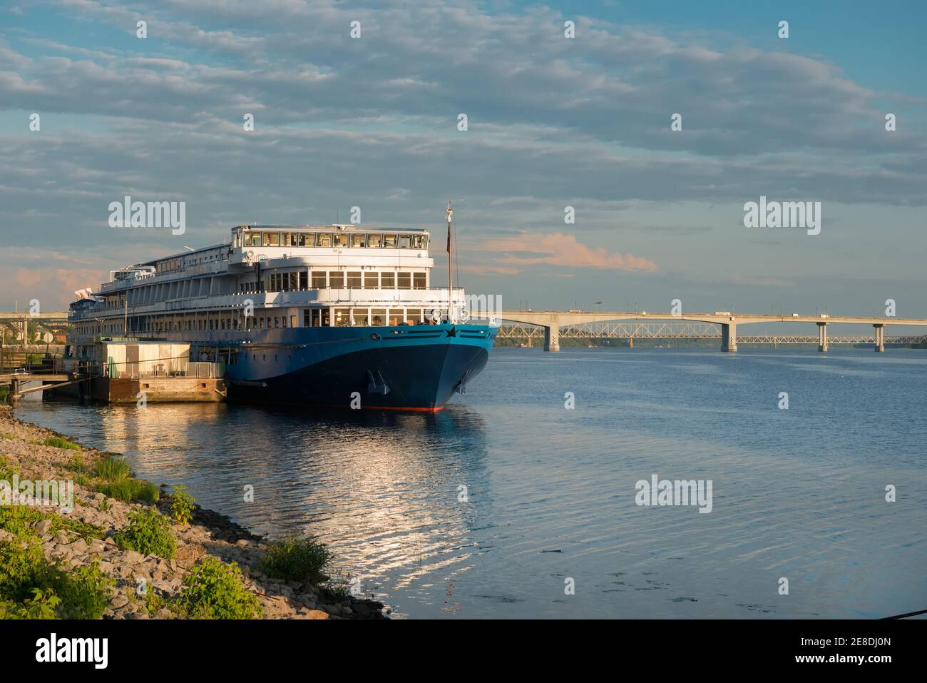 Cruise ship at the pier on the Volga river in the city of Kostroma on a summer evening Stock Photo