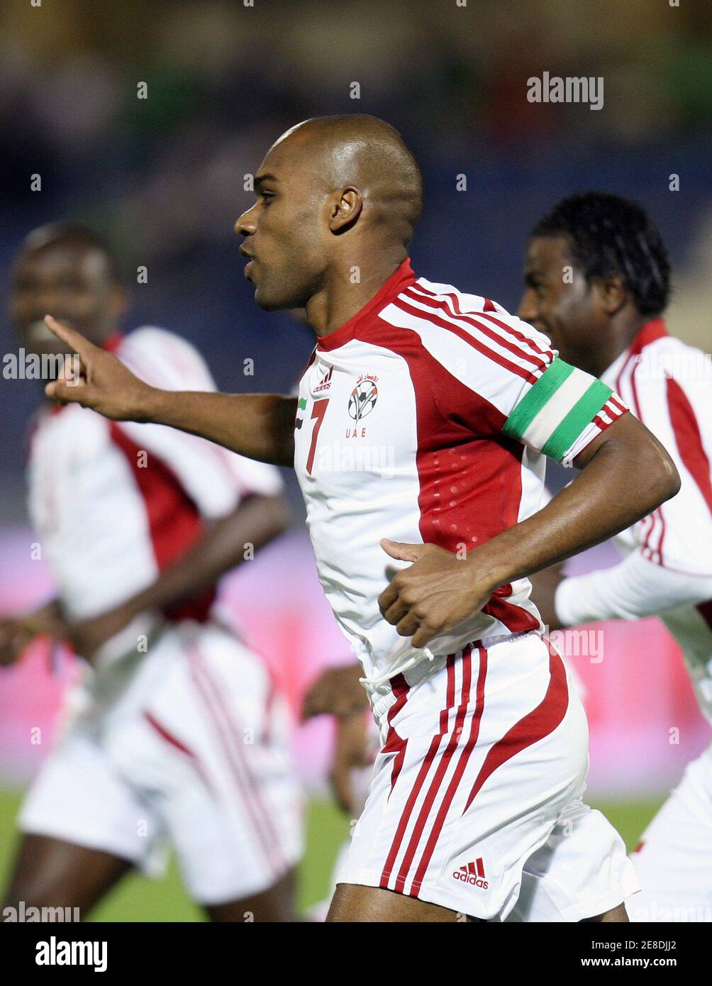 UAE's Mohammed Omar celebrates after scoring first goal against Yemen  during their Gulf Cup soccer match in Muscat January 5, 2009. REUTERS/Fadi  Al-Assaad (OMAN Stock Photo - Alamy