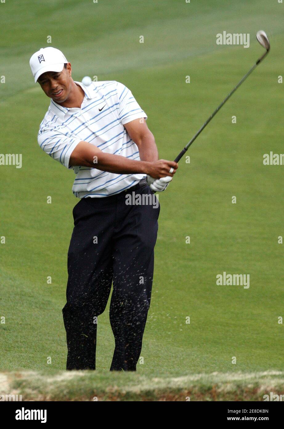 Tiger Woods of the U.S. chips to the 10th green during first round play in the Quail Hollow Championship in Charlotte, North Carolina, April 30, 2009.     REUTERS/Jason Miczek (UNITED STATES SPORT GOLF) Stock Photo