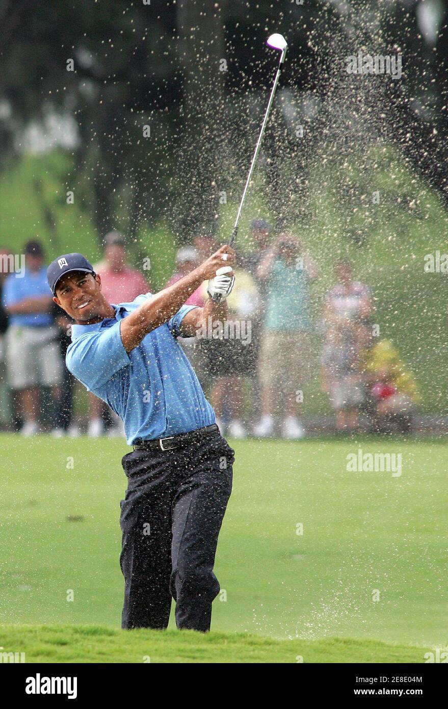 Tiger Woods hits out of a bunker on the 15th hole during the first round of play at The Players Championship golf tournament in Ponte Vedra Beach, Florida May 10, 2007. REUTERS/Rick Fowler (UNITED STATES) Stock Photo