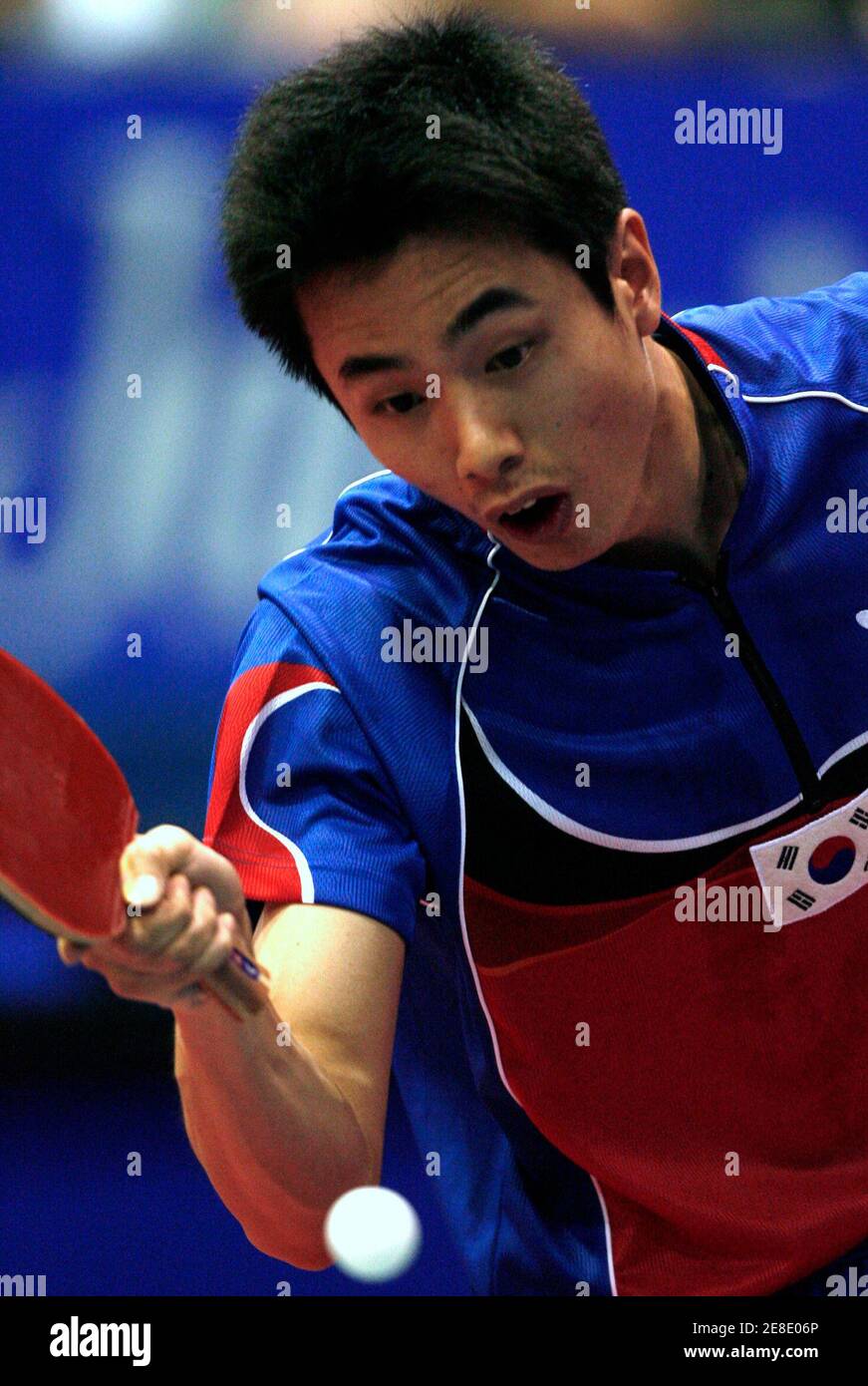 Se Hyuk Joo of South Korea returns a forehand against Long Ma of China  during their men's singles match at the World table tennis championships in  Zagreb May 25, 2007. REUTERS/Nikola Solic (