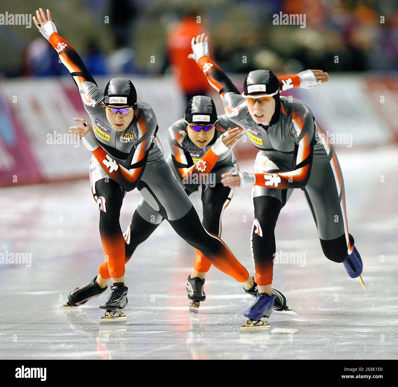 Kristina Groves (L), Shannon Rempel (C) and Christine Nesbitt of Canada skate to a second place finish in the ladies pursuit race during the 2007 ISU World Cup Speed Skating Championships at the Calgary Olympic Oval in Calgary, Alberta, November 18, 2007. REUTERS/Todd Korol (CANADA) Stock Photo