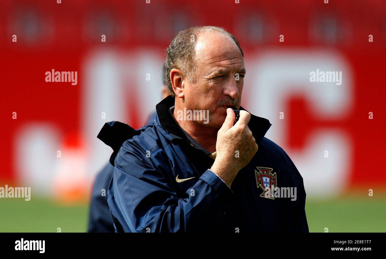 Portugal's coach Luiz Felipe Scolari blows a whistle during a training  session for the Euro 2008 soccer tournament at the Stade de la Maladiere in  Neuchatel, June 14, 2008. REUTERS/Jerry Lampen (SWITZERLAND)