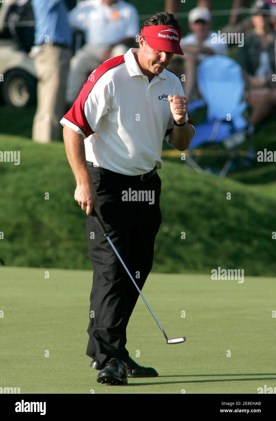 Phil Mickelson of the U.S. reacts after making an eagle putt on the 16th hole during the second round of play at The Players Championship golf tournament in Ponte Vedra Beach, Florida, May 11, 2007. Mickelson finished the round at five-under-par with a score of 139. REUTERS/Rick Fowler  (UNITED STATES) Stock Photo