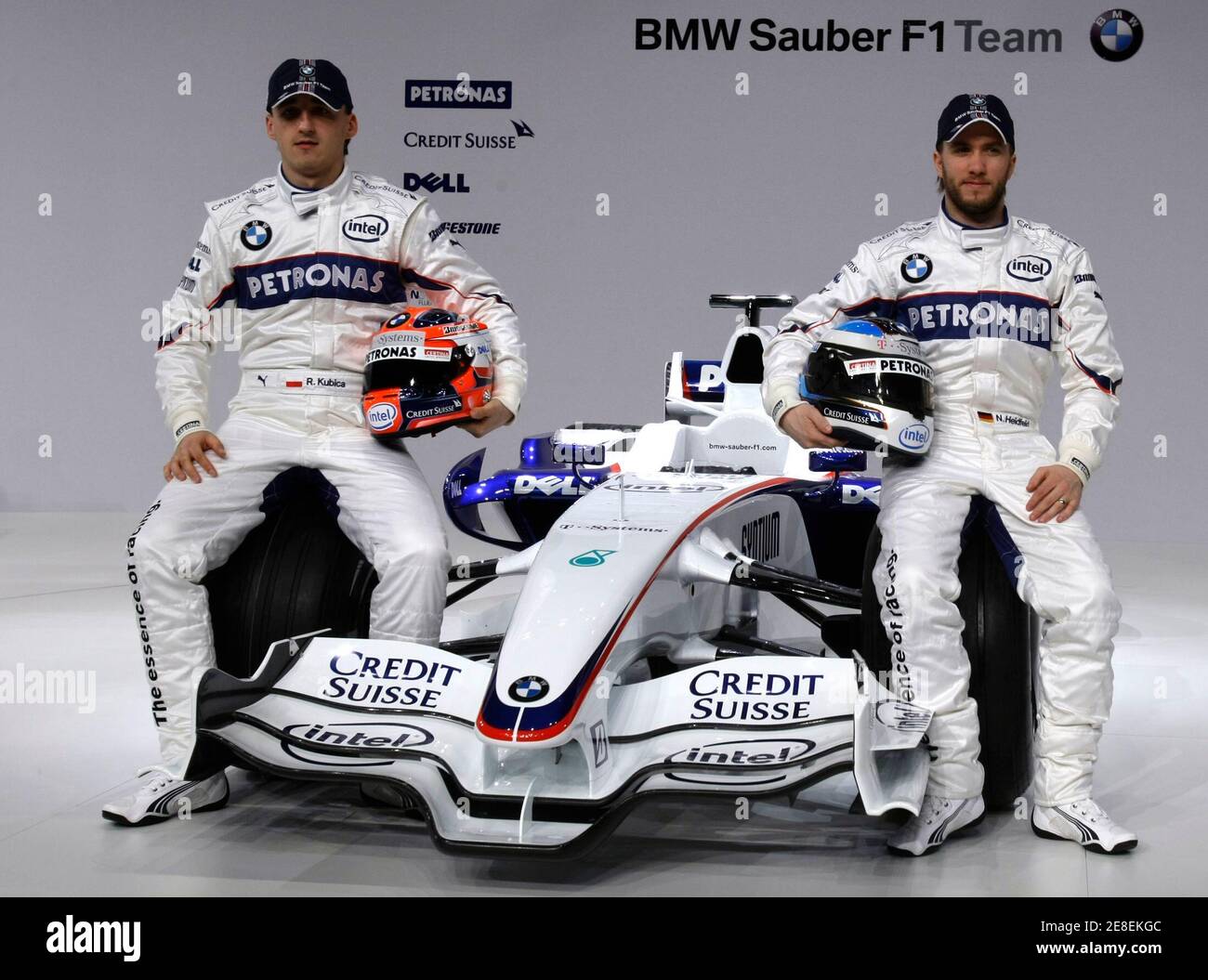 Poland's Robert Kubica and Germany's Nick Heidfeld (R) pose during the  presentation of the new BMW Sauber F1.08 racing car in Munich January 14,  2008. BMW Sauber, Formula One runners-up last season