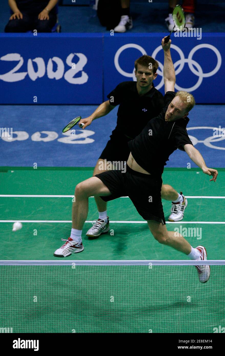 Jonas Rasmussen Front And Lars Paaske Of Denmark Compete In Their Men S Doubles Quarterfinal Badminton Match Against Poland At The Beijing 2008 Olympic Games August 13 2008 Reuters Beawiharta China Stock Photo Alamy