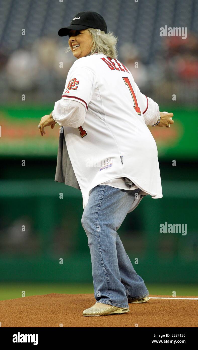 Food Network personality Paula Deen throws out the first pitch prior to the Washington Nationals versus New York Mets MLB baseball game in Washington, May 19, 2010.     REUTERS/Gary Cameron     (UNITED STATES - Tags: SPORT BASEBALL ENTERTAINMENT FOOD) Stock Photo