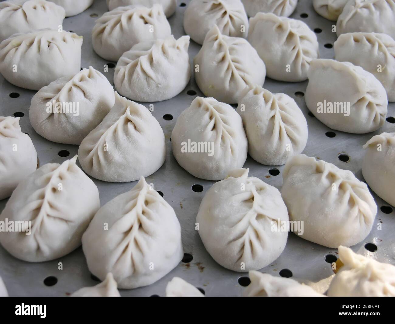 hand made dumplings, a kind of chinese noodles Stock Photo Alamy