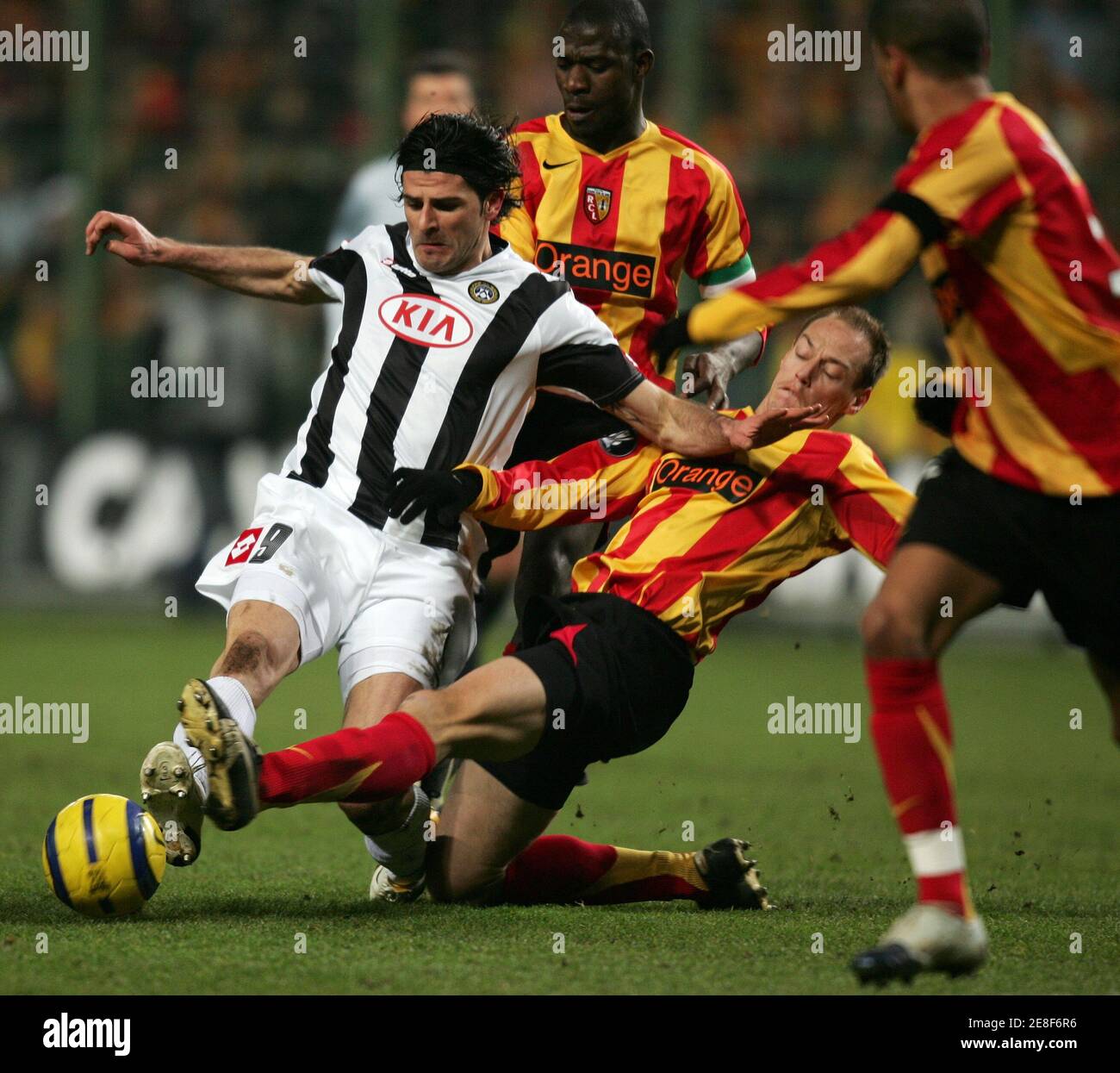 Racing Lens Nicolas Gillet R Tackles Udinese S Vincenzo Iaquinta L During Their Uefa Cup Soccer Match At The Felix Bollaert Stadium In Lens February 23 2006 Reuters Pascal Rossignol Stock Photo Alamy