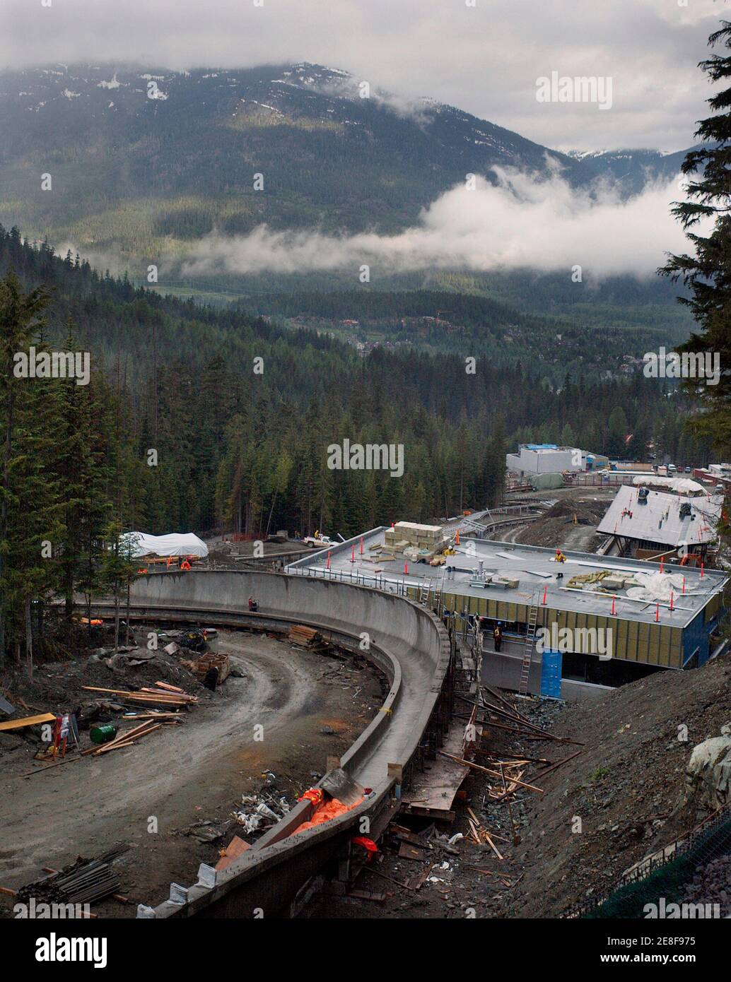 The site for the bobsleigh, luge and skeleton track for the the 2010 Olympic Winter Games is shown under construction in Whistler, British Columbia June 13, 2007.       REUTERS/Andy Clark        (CANADA) Stock Photo