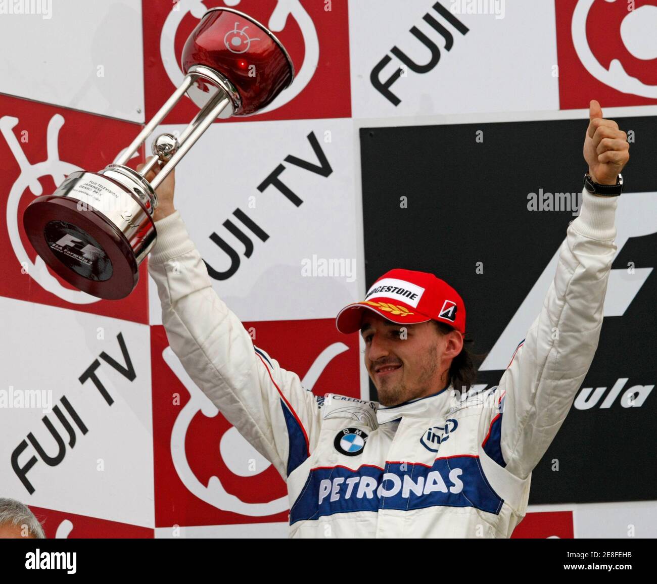 Bmw Sauber Formula One Driver Robert Kubica Of Poland Celebrates After Taking Second Place In The Japanese F1 Grand Prix At Fuji Speedway In Oyama Central Japan October 12 08 Reuters Issei Kato