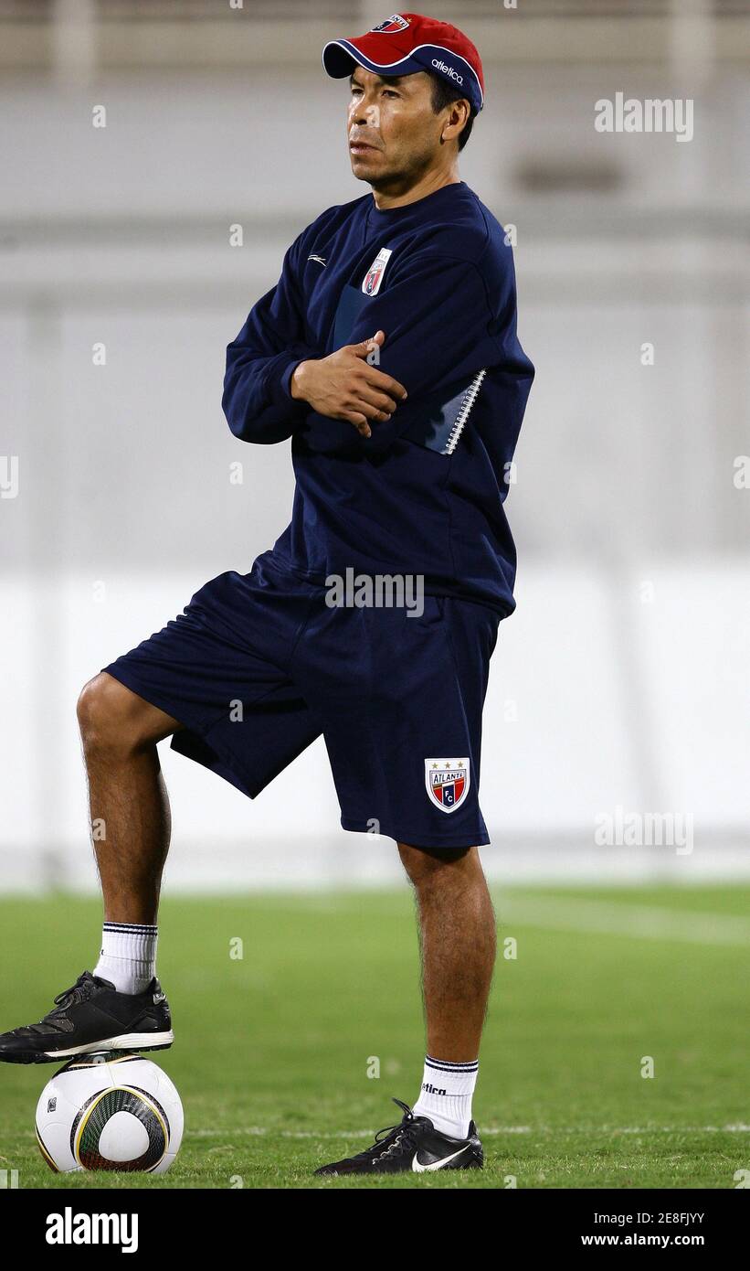 Atlante's coach Jose Cruz watches during a training session at Al Nahyan stadium in Abu Dhabi December 10, 2009. Mexico's Atlante will play Auckland City on Saturday during the FIFA Club World Cup soccer tournament in Abu Dhabi. REUTERS/Fahad Shadeed (UNITED ARAB EMIRATES SPORT SOCCER) Stock Photo