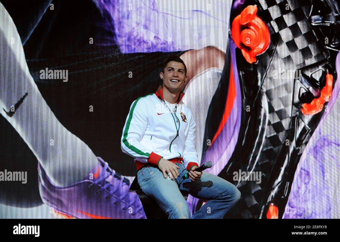Real Madrid's Portuguese soccer player Cristiano Ronaldo smiles during the  launch of the new Nike Mercurial Vapor Superfly II soccer boot at an event  in London February 24, 2010. REUTERS/Jas Lehal (BRITAIN -