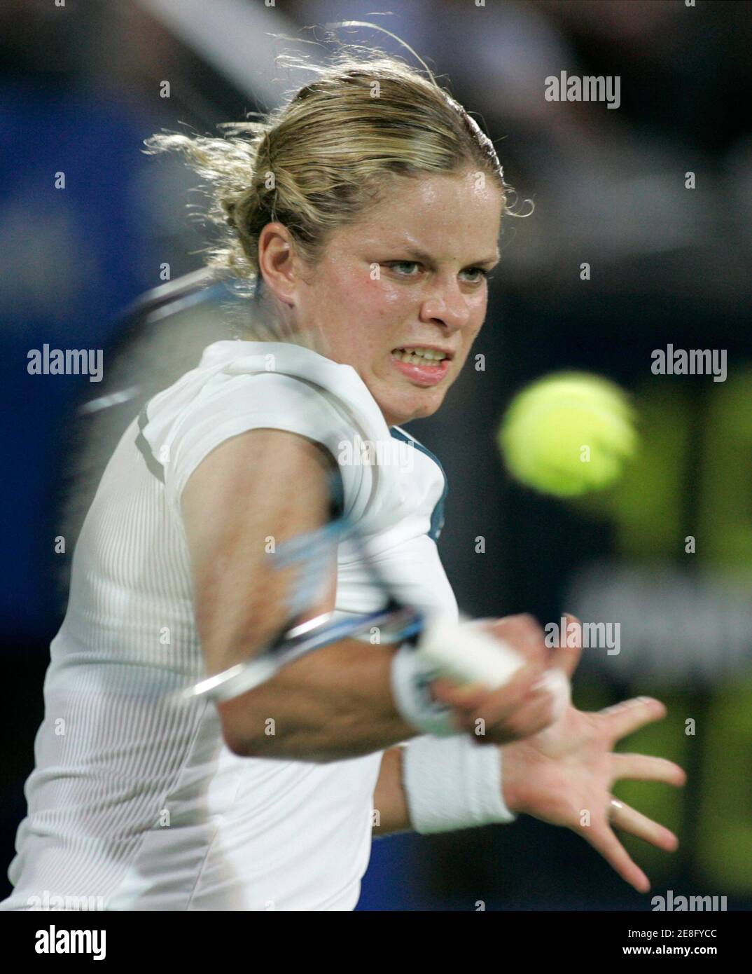Kim Clijsters of Belgium hits a shot during her win over Jelena Jankovic of Serbia in the women's singles final of the Sydney International tennis tournament at Olympic Park in Sydney January 12, 2007. REUTERS/Will Burgess  (AUSTRALIA) Stock Photo