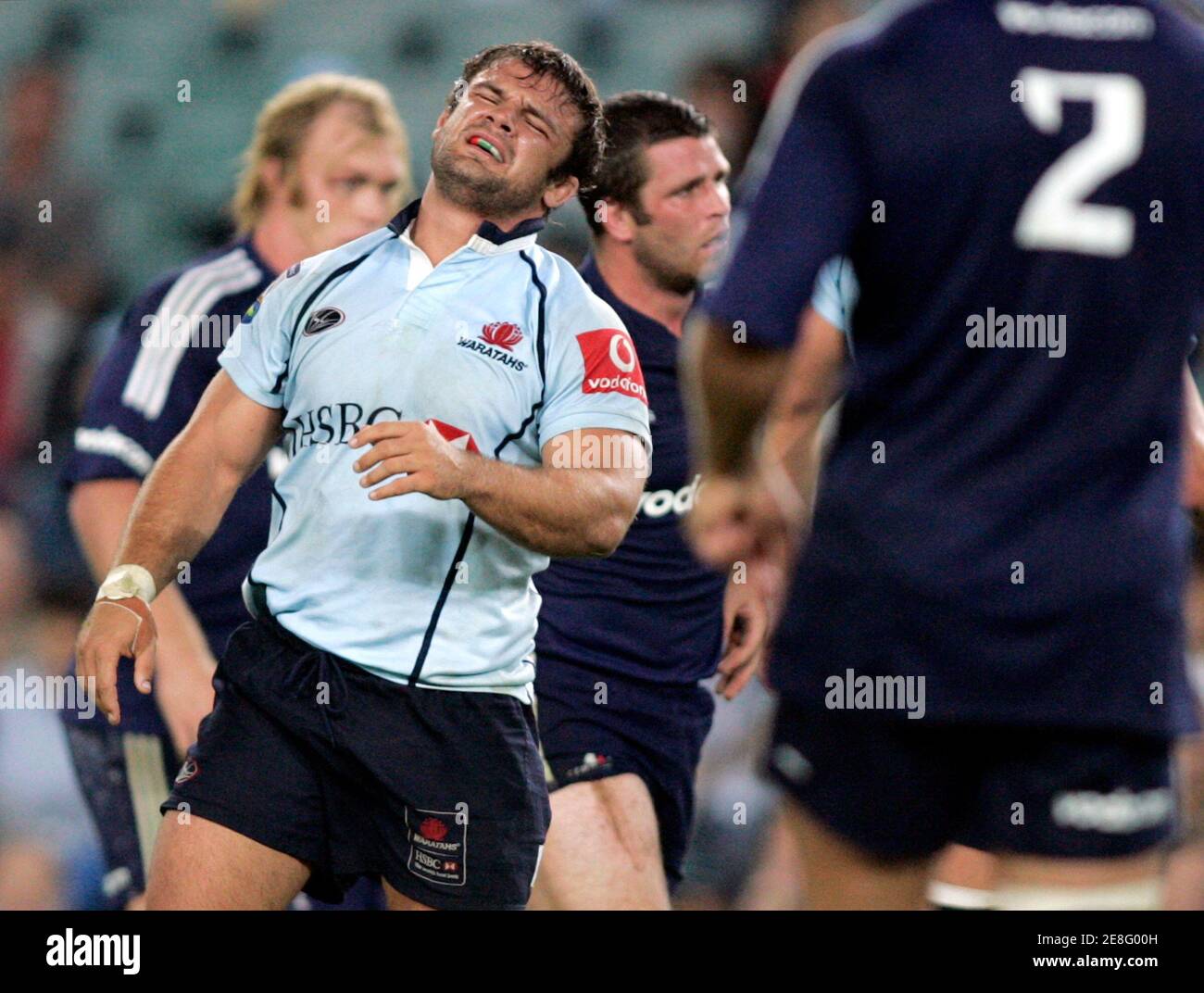 Captain of the Waratahs Adam Freier (2nd-L) reacts after a mistake during his team's loss to the Stormers of South Africa in their Super 14 rugby union match in Sydney March 17, 2007. REUTERS/Will Burgess   (AUSTRALIA) Stock Photo