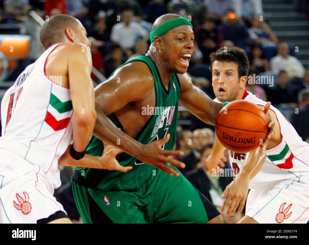Boston Celtics' Paul Pierce is challenged by Toronto Raptors' Anthony Parker (L) and Jason Kapono (R) during an exhibition tournament basketball game in Rome October 6, 2007. The game is part of the NBA Europe Live tour.  REUTERS/Giampiero Sposito (ITALY) Stock Photo