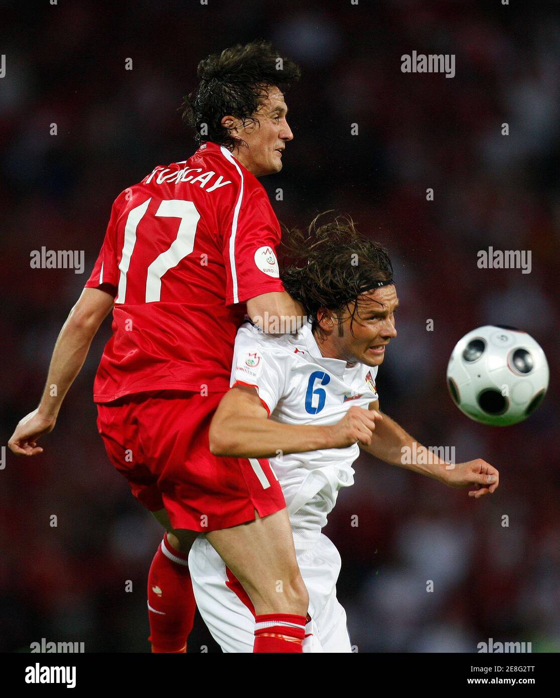 Turkey's Tuncay Sanli (L) challenges Czech Republic's Marek Jankulovski during their Group A Euro 2008 soccer match at Stade de Geneve stadium in Geneva June 15, 2008.     REUTERS/Jerry Lampen (SWITZERLAND)   MOBILE OUT. EDITORIAL USE ONLY Stock Photo