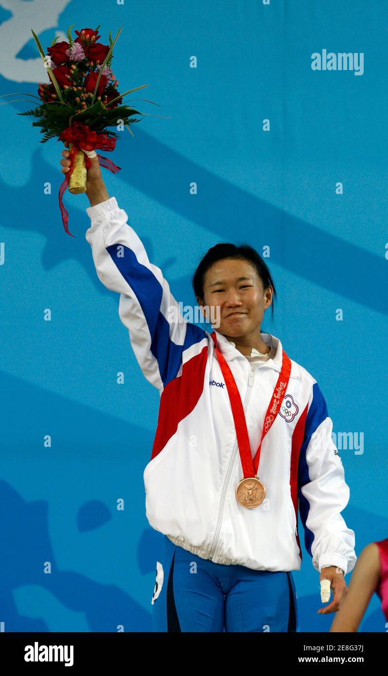 Chen Wei-ling of Taiwan poses with her bronze medal in the women's 48kg Group A weightlifting competition at the Beijing 2008 Olympic Games August 9, 2008.     REUTERS/Oleg Popov (CHINA) Stock Photo