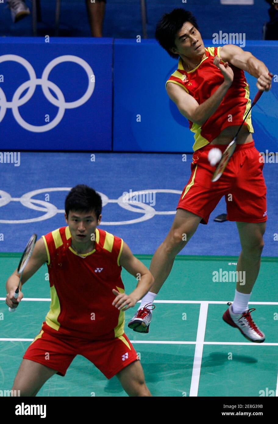 Fu Haifeng (R) and Cai Yun of China compete in their men's doubles quarterfinals badminton match against the U.S. at the Beijing 2008 Olympic Games August 13, 2008.     REUTERS/Beawiharta (CHINA) Stock Photo