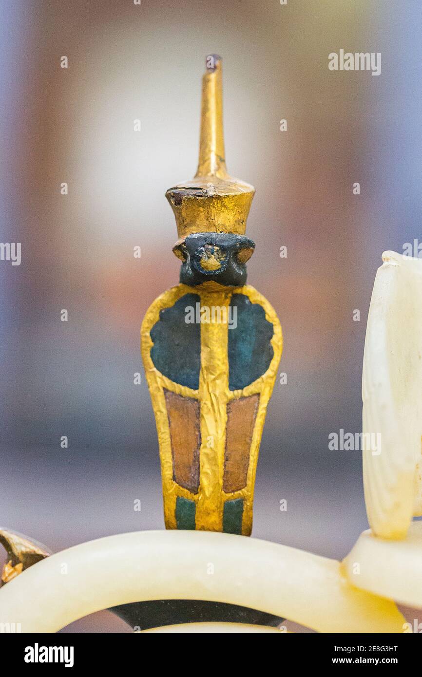 Egypt, Cairo, Tutankhamon alabaster, from his tomb in Luxor : Detail of a composite perfume vase, a cobra wearing the red crown. Stock Photo