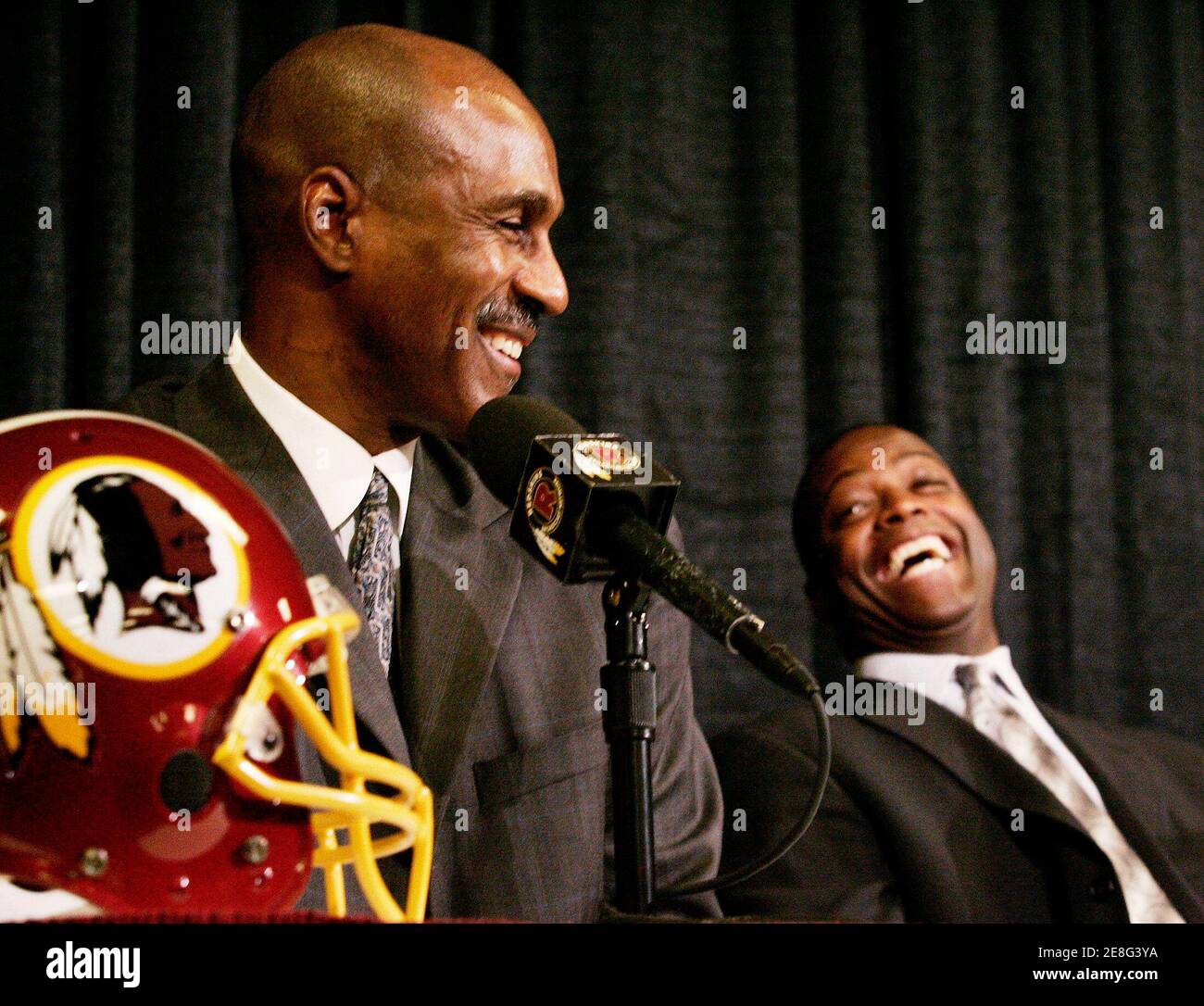 Former Washington Redskins players Darrell Green (R) and Art Monk laugh during a news conference at the team facility in Ashburn, Virginia on February 5, 2008. Both players will be inducted into the NFL Pro Football Hall of Fame in Canton, Ohio on August 2, 2008.      REUTERS/Gary Cameron   (UNITED STATES) REUTERS Stock Photo