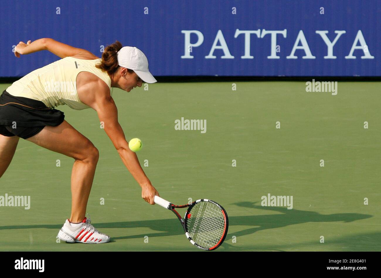 Russia's Vesna Manasieva returns a shot to Russia's Ekaterina Bychkova during their quarter- final round match at the Pattaya Women's Open tennis tournament February 8, 2008. REUTERS/Chaiwat Subprasom (THAILAND) Stock Photo