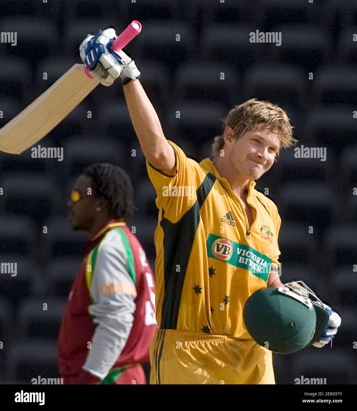 Australia's Shane Watson celebrates his century during their third one-day cricket international against West Indies in St. George's, Grenada June 29, 2008.       REUTERS/Andy Clark        (GRENADA) Stock Photo