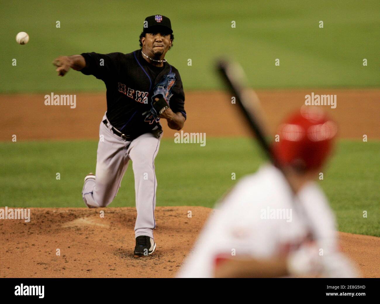 New York Mets starting pitcher Pedro Martinez (top) throws to Washington Nationals batter Ryan Zimmerman in the first inning of their MLB National League baseball game in Washington September 15, 2008.       REUTERS/Gary Cameron   (UNITED STATES) Stock Photo