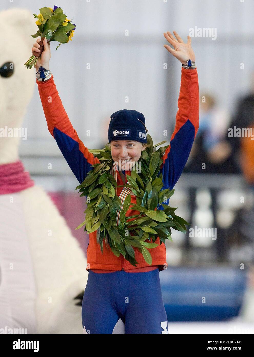 Renate Groenewold of the Netherlands celebrates her first place on the podium in the ladies 3000-metre during the World Cup Single Distance speed skating in Richmond, British Columbia March 12, 2009.       REUTERS/Andy Clark     (CANADA SPORT SPEED SKATING) Stock Photo