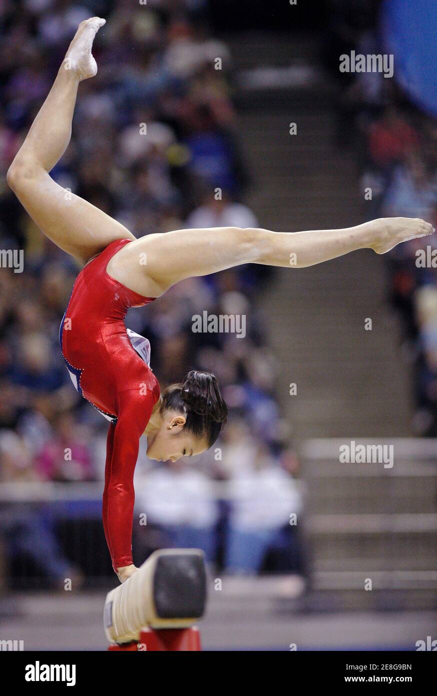 Ivana Hong of the U.S. performs her routine in women's beam final at the Gymnastic World Championships at the O2 Arena in London October 18, 2009. Hong came third in the event.  REUTERS/Jerry Lampen (BRITAIN SPORT GYMNASTICS) Stock Photo