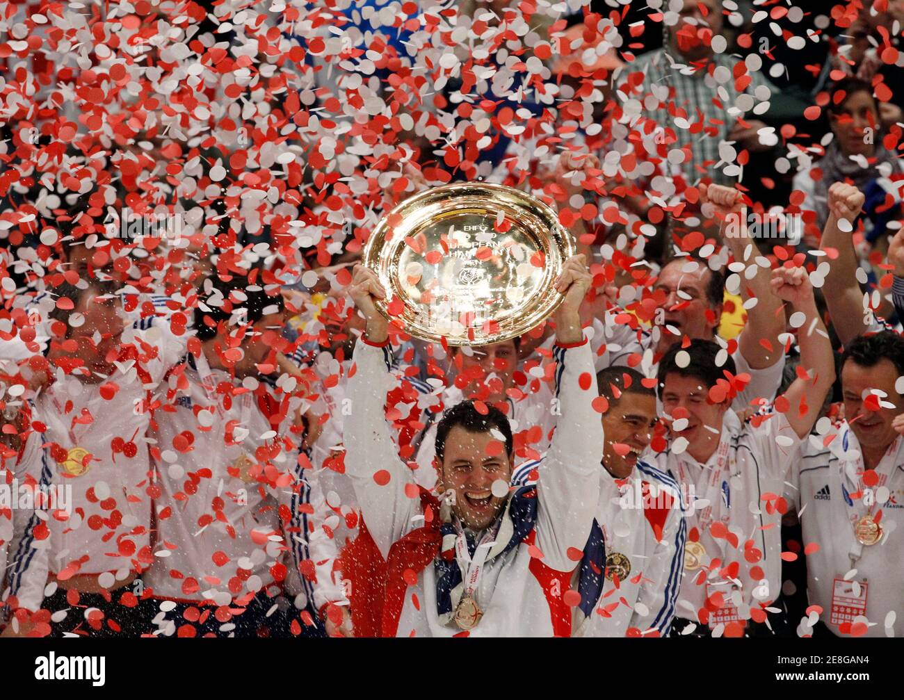 France's team pose with the gold medal after winning the Men's European Handball Federation Championship final match against Croatia in Vienna, January 31, 2010.           REUTERS/Oleg Popov   (AUSTRIA - Tags: SPORT HANDBALL) Stock Photo