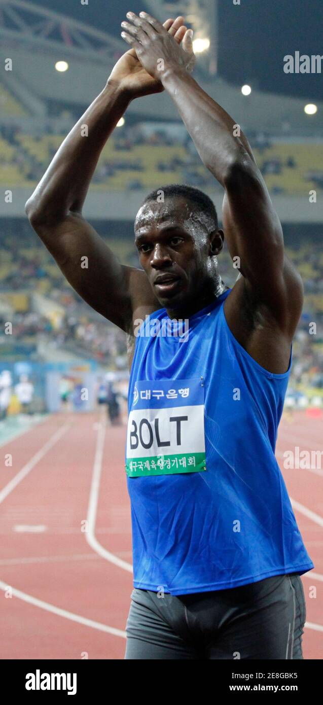 Usain Bolt of Jamaica reacts after he won in the men's 100 metres final at the 2010 Colorful Daegu Pre-Championships Meeting in Daegu, southeast of Seoul, May 19, 2010.    REUTERS/Jo Yong-Hak (SOUTH KOREA - Tags: SPORT ATHLETICS) Stock Photo