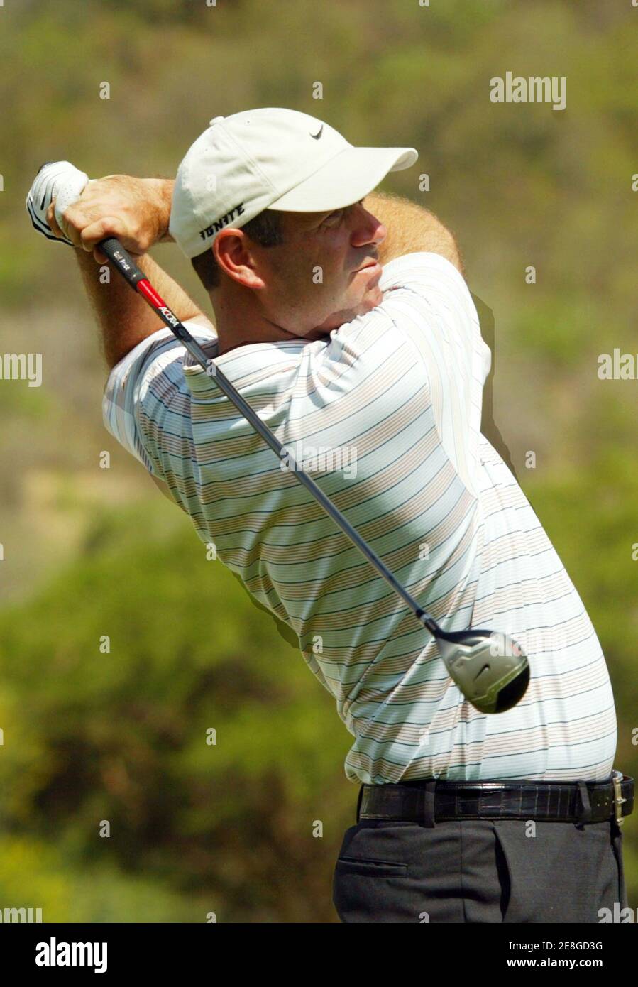 Stewart Cink of the U.S. plays a shot during the first day of the $4 million Sun City Golf Challenge in Sun City, west of Johannesburg, in South Africa December 1, 2005. Cink finished at one over 73. REUTERS/Juda Ngwenya Stock Photo