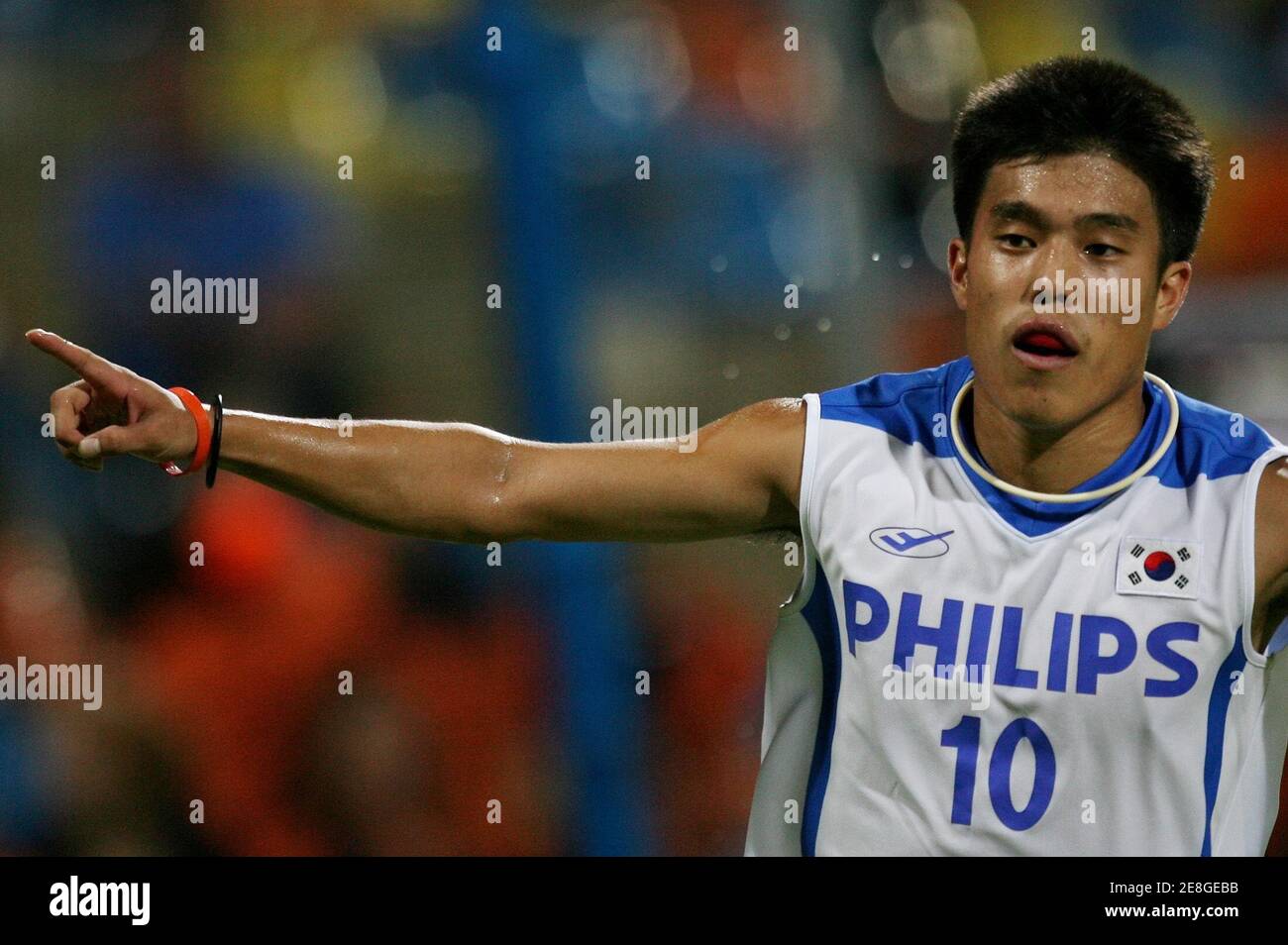 South Korea's Hoy Sik You celebrates after scoring against the Netherlands during their Men's Field Hockey World Cup match at the Warsteiner Hockey Park stadium in Moenchengladbach September 6, 2006. REUTERS/Pascal Lauener  (GERMANY) Stock Photo