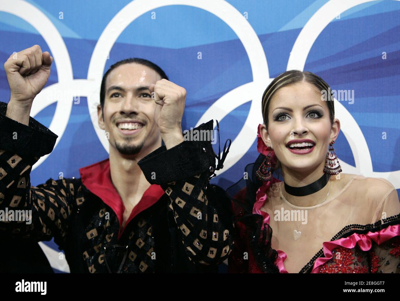 Tanith Belbin and Benjamin Agosto (L) from the U.S. celebrate after their free dance in the ice dancing competition during the Figure Skating at the Torino 2006 Winter Olympic Games in Turin, Italy, February 20, 2006. Stock Photo