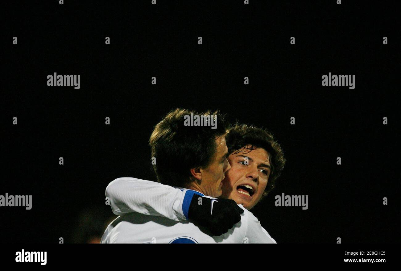 FC Zurich's Blerim Dzemaili (R) and Alain Rochat celebrate after scoring a goal against FC Thun during their Swiss Super League soccer match in Thun December 2, 2006. REUTERS/Pascal Lauener (SWITZERLAND) REUTERS Stock Photo