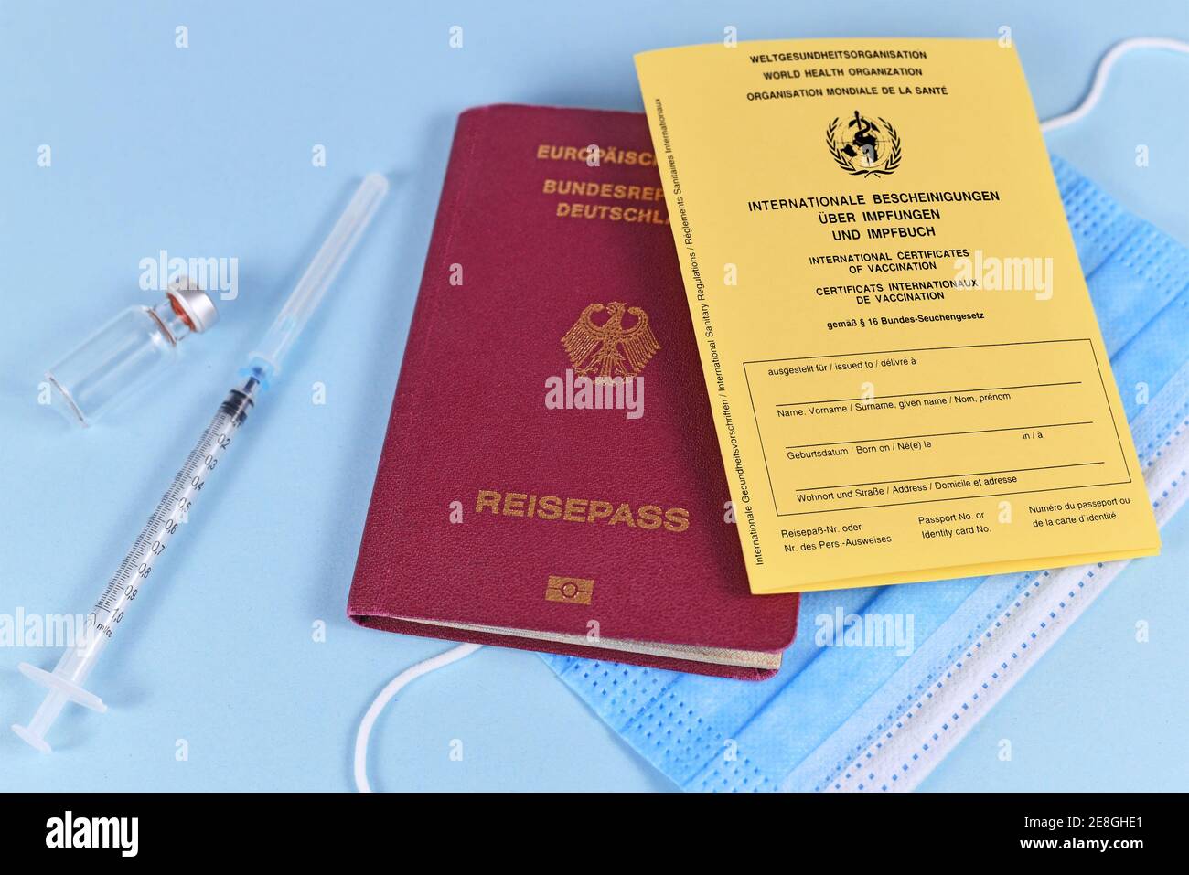 Concept for travel restrictions for people without corona virus vaccination with international certificate of vaccination, German travel Stock Photo