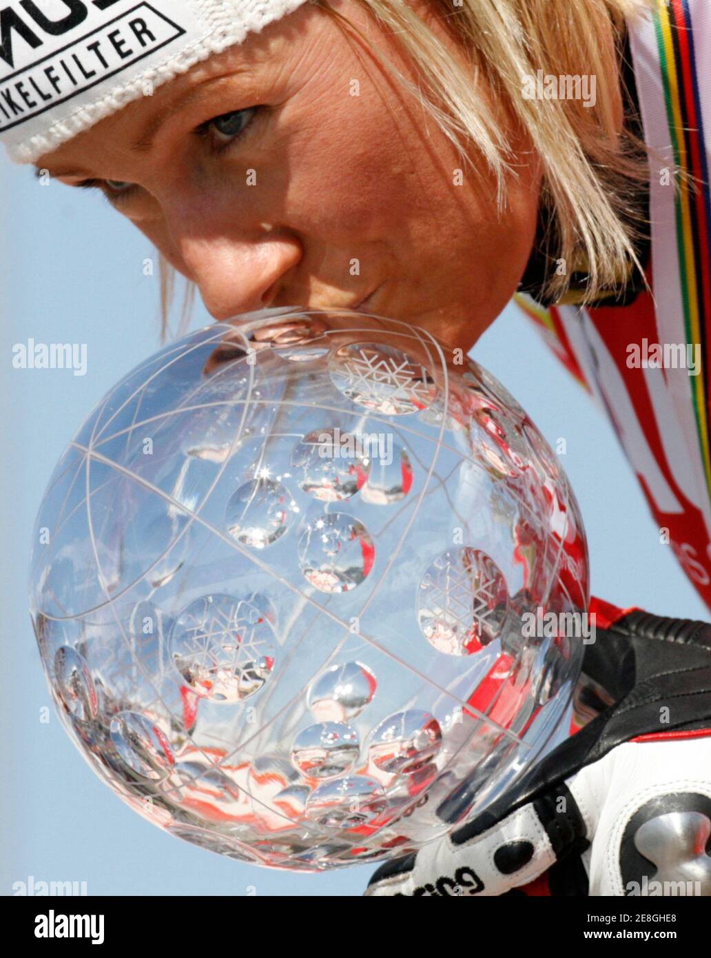 Renate Goetschl of Austria kisses her women's overall super-G Alpine Ski World Cup trophy after the seasons last race at the Alpine Ski World Cup Finals in Lenzerheide March 15, 2007. REUTERS/Pascal Lauener (SWITZERLAND) Stock Photo